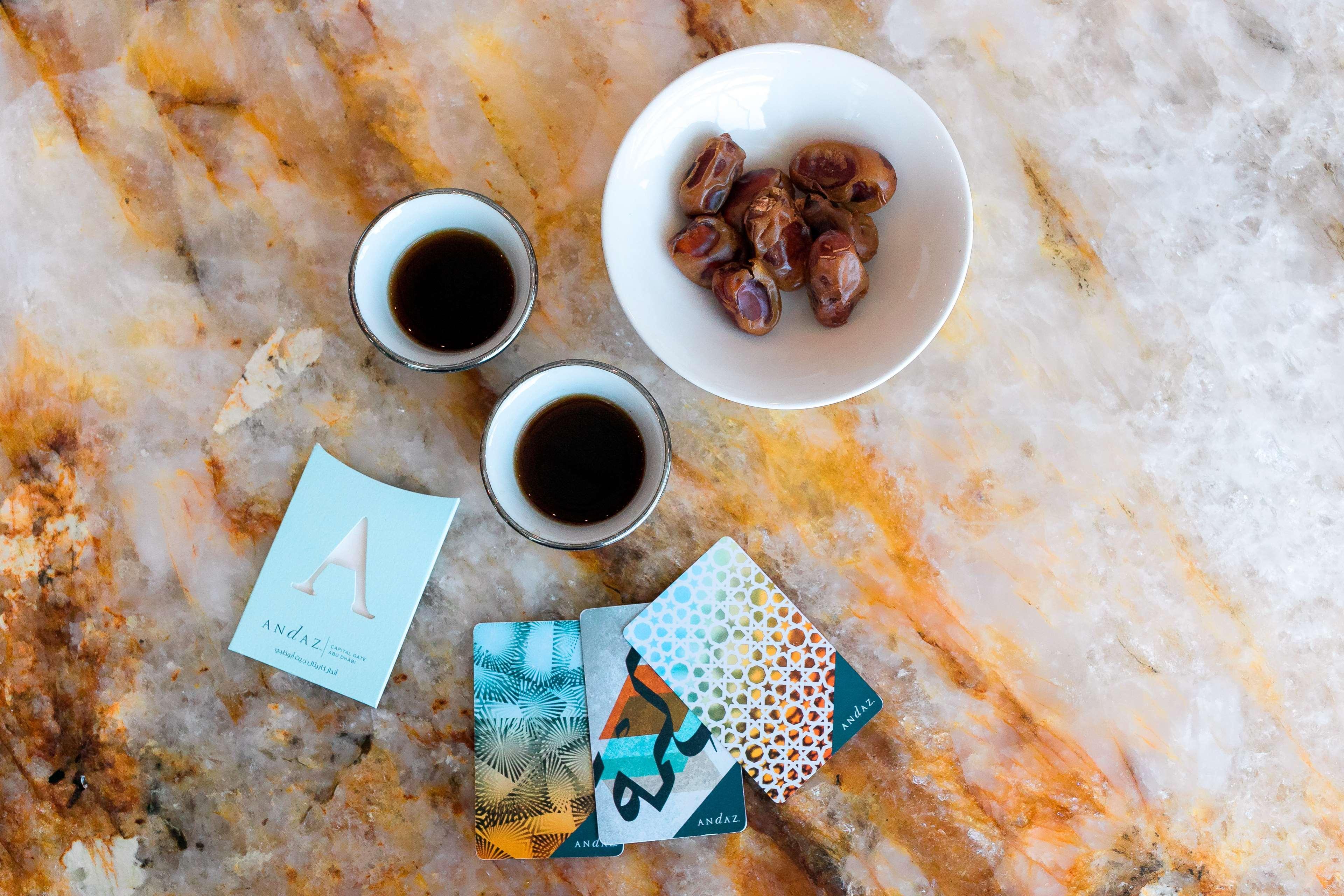 Andaz Capital Gate Abu Dhabi, By Hyatt Hotel Екстериор снимка A cup of coffee with a bowl of dates